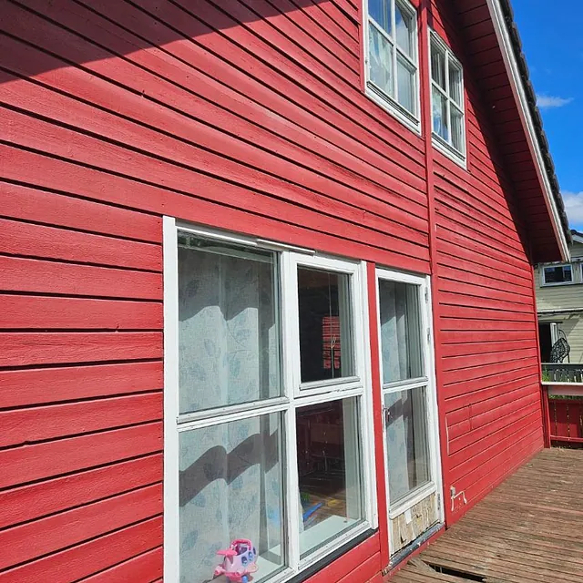 utskiftning av veranda og en gavlvegg med ny utgangsdør og og balkongdør